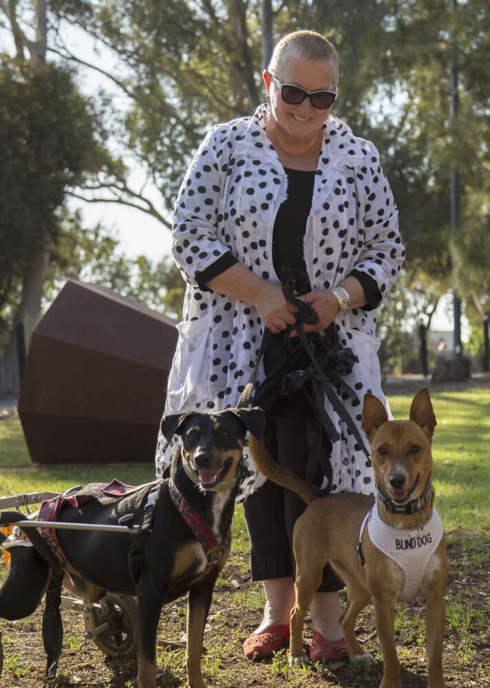 Annie Whitlocke with two of her rescue dogs