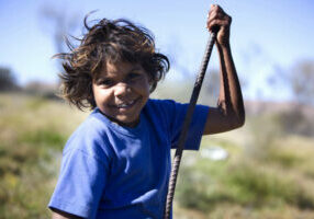 A happy Indigenous girl living in out back Australia